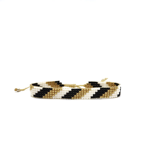 Pulsera Miyuki chica diagonal negro oro blanco